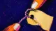 Unclaimed Want A blank gift tag twisted around its string until the corner tears, symbolizing a need erased before,