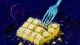 Cut Into Quiet A fork repeatedly cutting one bite into tiny pieces, symbolizing the self-silencing freeze of an un