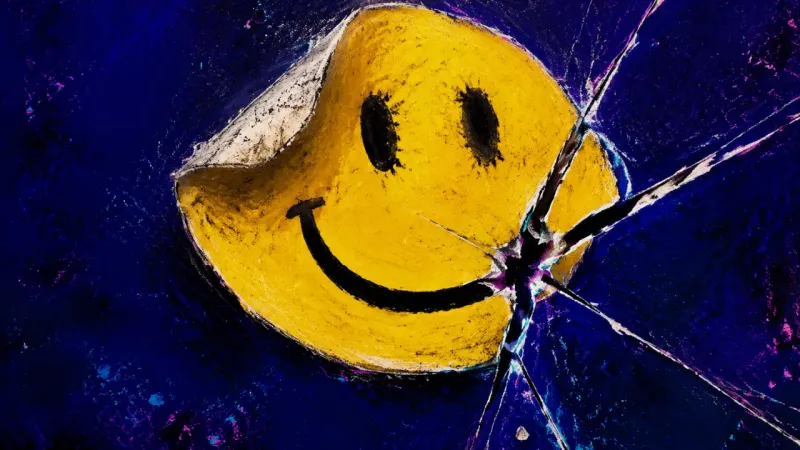 Sticker Over Rupture A smiley sticker pressed over a cracked screen protector, symbolizing a playful apology that hides a