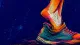 A tense foot crushes the heel of the opposite shoe, symbolizing self-silencing when a manager