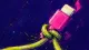 The Tethered Reply A charging cable cinched into a hard knot around its connector, symbolizing fear that a family limit