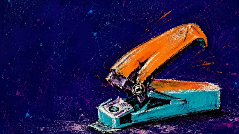 A desk stapler crushed and jammed open after repeated empty presses, symbolizing self-silencing to
