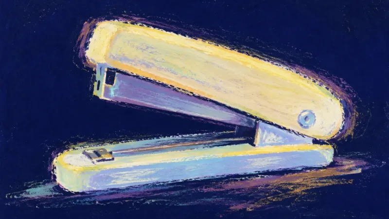 A restored stapler in balanced alignment, symbolizing anger held with care and honest communicationg