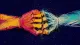 The Reflex to Withdraw Two interlaced hands pull against each other, reflecting the bodily dread of returning to peerReview