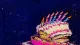 The Unplayed Evening A crushed birthday cake symbolizing family time repeatedly surrendered to obligations on an unchosen