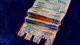 Unclaimed Evidence A folded receipt with compressed transaction lines, symbolizing the compulsion to seek self-worth in