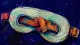 A sleep mask twisted into a knot, symbolizing the loss of rest while someone carries every friend's