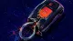 A damaged car key fob symbolizes resentment from repeatedly carrying a group's transport plans.
