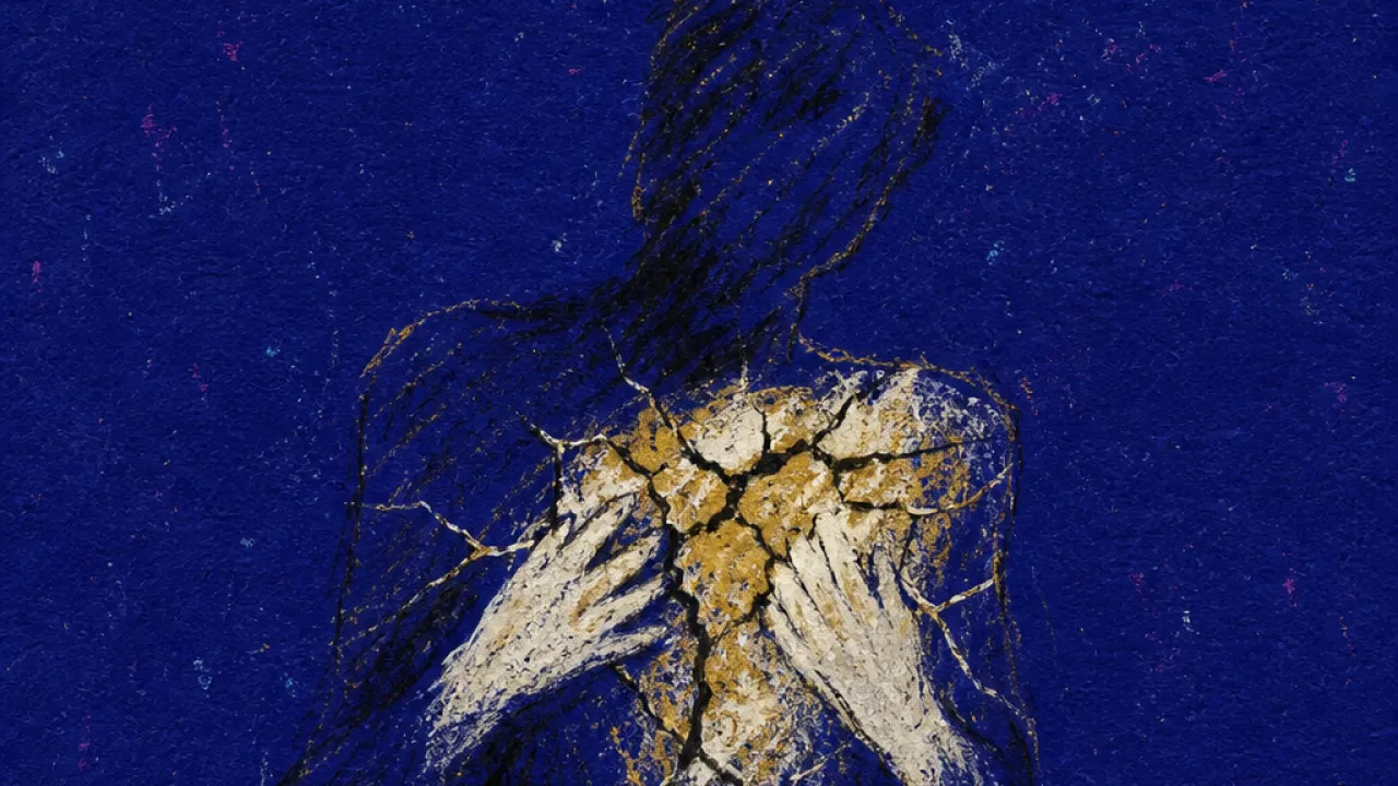 A solitary figure with chest held tight as bright hands cover visible cracks with yellow paint in deep indigo space