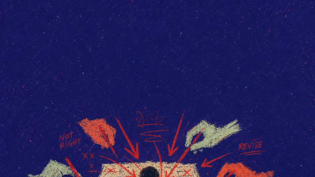 A solitary figure bent over a marked page as many hands push red revisions into the crowded surface