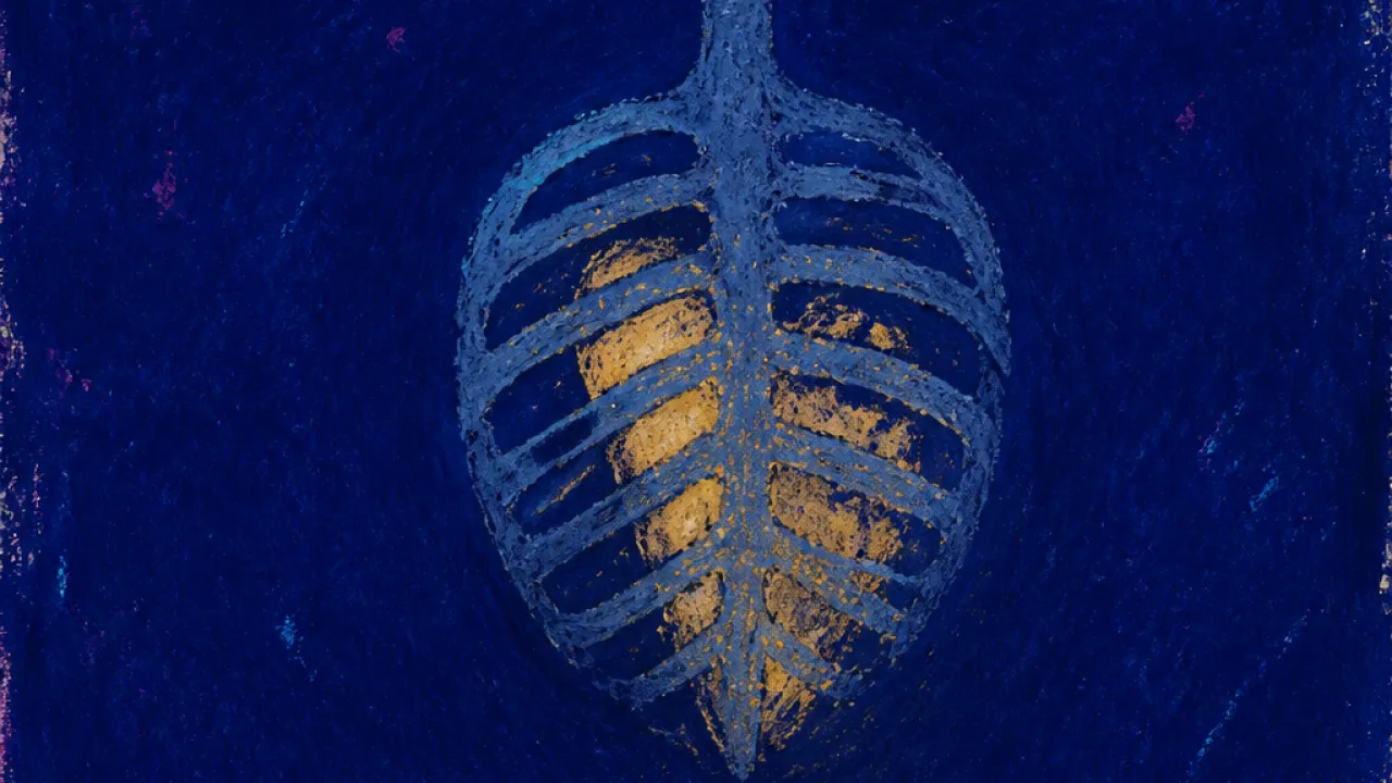 Quiet That Feels Loaded A solitary figure with a still ribcage, steel blue space pressing around pale amber light in a quiet dark room